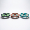RollyGreens rolling plant dollies available in three colors - black, brown, and teal with smooth-glide casters